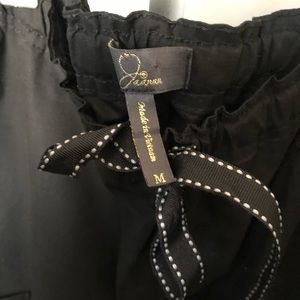 Women’s Jaanuu brand flare scrub pants